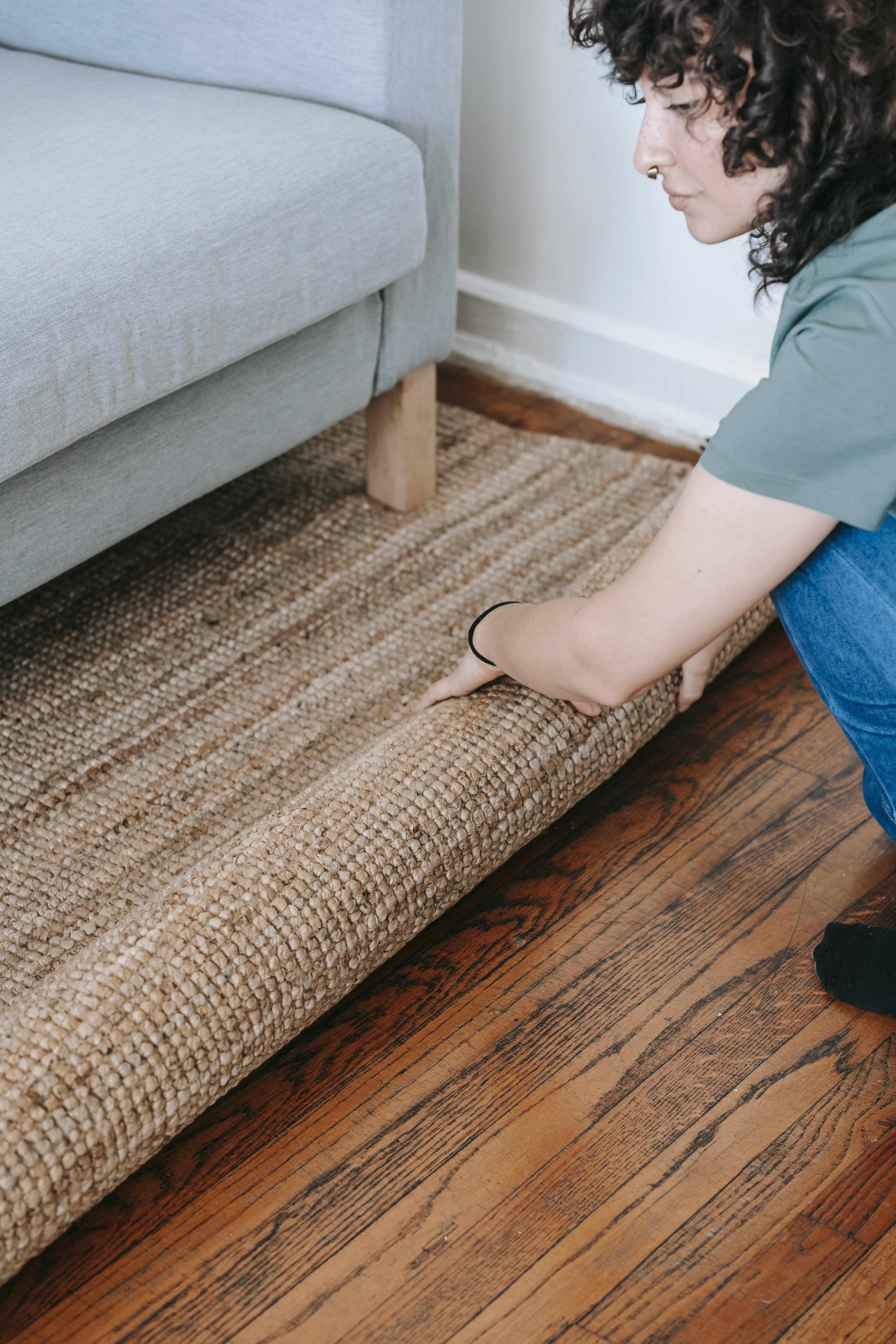 can you put carpet over laminate flooring