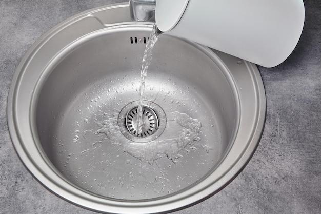 garbage disposal draining into other sink