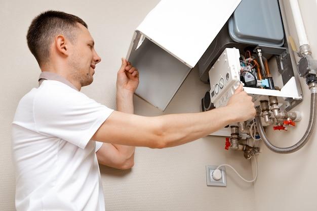 does a plumber or electrician install a hot water heater