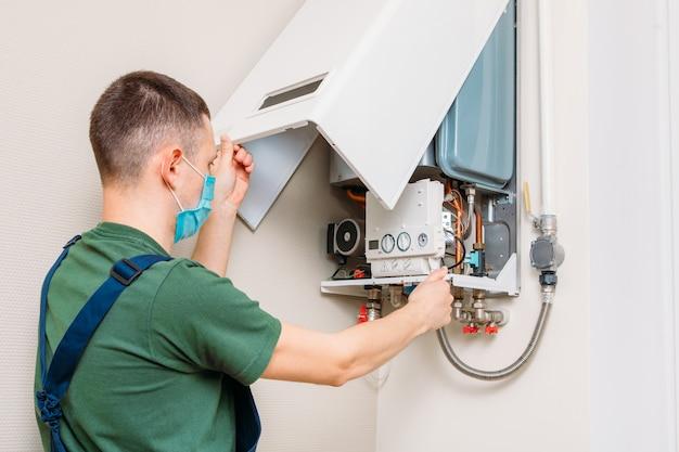 does a plumber or electrician install a hot water heater