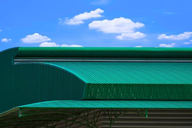 green house with metal roof