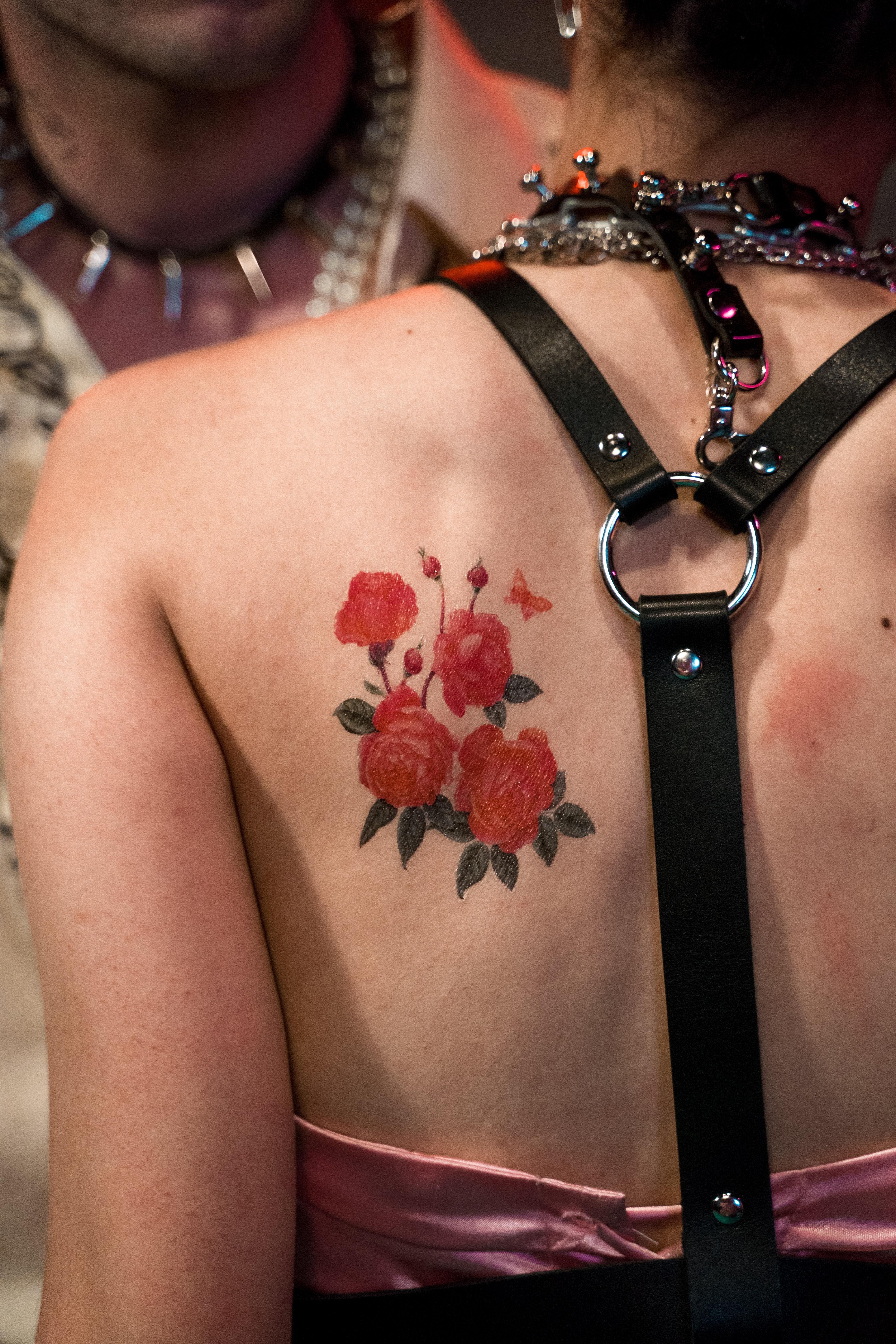 rose spine tattoo
