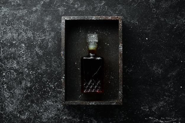 liquor in black bottle