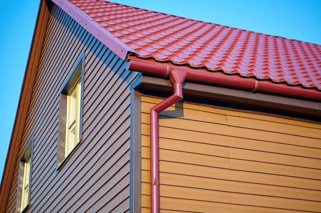 pros and cons of gutters on a house