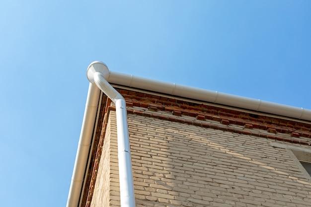 pros and cons of gutters on a house