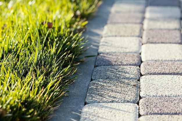 How To Install Edging Pavers On A Slope 