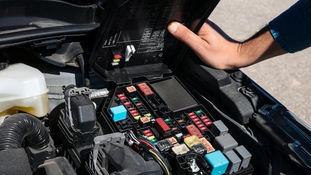 How do I reset my fuse box in my car? 