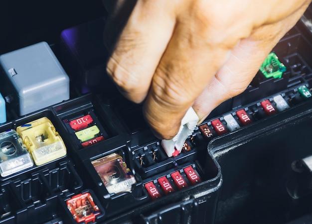 How do I reset my fuse box in my car? 
